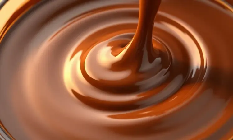 Close-up em 3D de um creme de chocolate brilhante e espesso mostrando o ponto perfeito do brigadeiro.